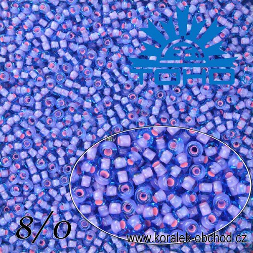 Korálky TOHO tvar ROUND (kulaté). Velikost 8/0. Barva č. 938-Inside-Color Rainbow Crystal/Grape Lined. Balení 10g.