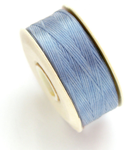 NYMO-nylonová nit plochá označení B barva CATHAY BLUE o pr. 0,2 mm délka cca 66m.
