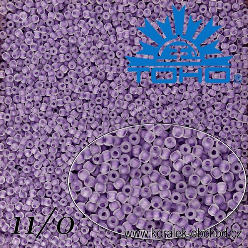 Korálky TOHO tvar ROUND (kulaté). Velikost 11/0. Barva č.774F-Inside-Color Frosted Crystal/Grape Lined . Balení 8g.
