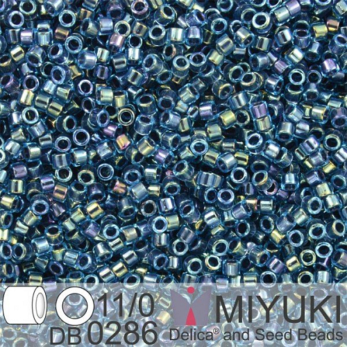 Korálky Miyuki Delica 11/0. Barva Midnight Blue Lined Aqua AB DB0286. Balení 5g.