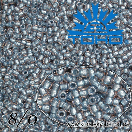Korálky TOHO tvar ROUND (kulaté). Velikost 8/0. Barva č. 288-Inside-Color Crystal/Metallic Blue Lined .. Balení 10g.