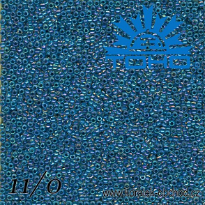 Korálky TOHO tvar ROUND (kulaté). Velikost 11/0. Barva č.188-Inside-Color Luster Crystal/Capri Blue Lined . Balení 8g.