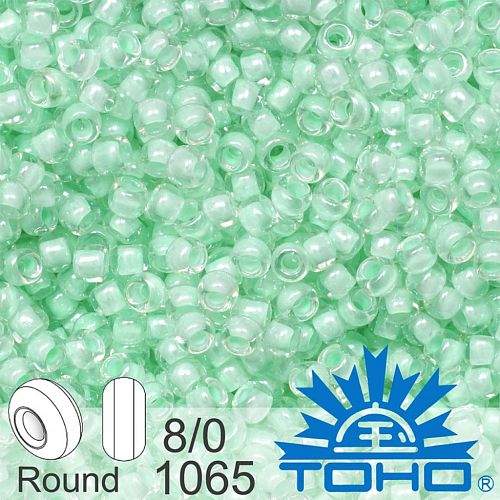 Korálky TOHO tvar ROUND (kulaté). Velikost 8/0. Barva 1065 Inside-Color Crystal/Mint-Lined. Balení 10g.