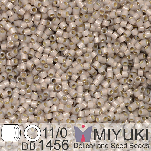 Korálky Miyuki Delica 11/0. Barva Silverlined Light Taupe Opal DB1456. Balení 5g