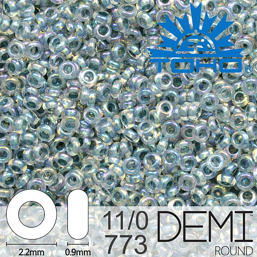 Korálky TOHO Demi Round 11/0. Barva 773 Inside-Color Rainbow Crystal/Montana Blue-Lined. Balení 5g.