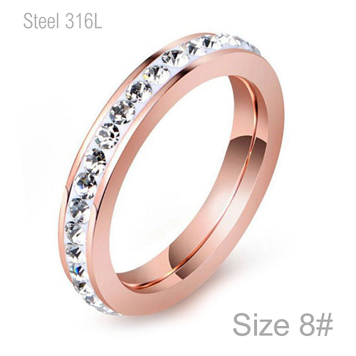 Prsten z chirurgické ocele v barvě ROSE GOLD P 232 s krystalovými kamínky po celém obvodě o velikosti 8