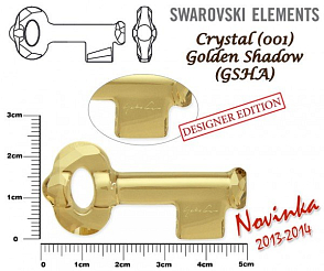 SWAROVSKI KEY to the Forest 6918 ( podpis YOKO ONO) barva Crystal GOLDEN SHADOW velikost 50mm.