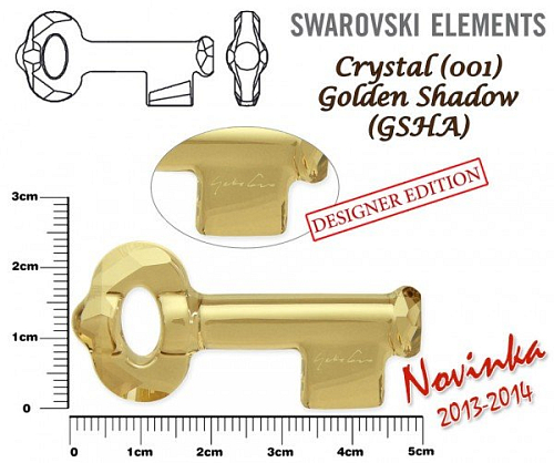 SWAROVSKI KEY to the Forest 6918 ( podpis YOKO ONO) barva Crystal GOLDEN SHADOW velikost 50mm.