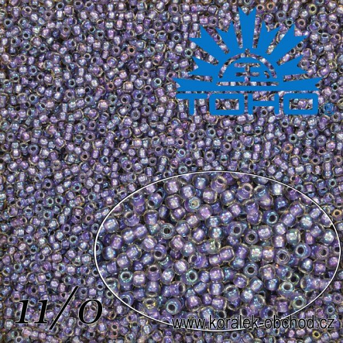 Korálky TOHO tvar ROUND (kulaté). Velikost 11/0. Barva č. 265-Inside-Color Rainbow Crystal/Metallic Purple Lined . Balení 8g.
