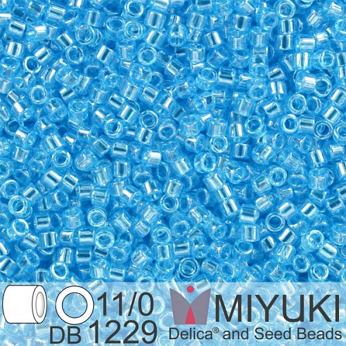 Korálky Miyuki Delica 11/0. Barva Tr Ocean Blue Luster  DB1229. Balení 5g