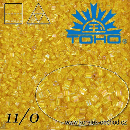 Korálky TOHO tvar TRIANGLE (trojúhelníkové). Velikost 11/0. Barva č. 192-Inside-Color Crystal/Yellow Lined . Balení 10g.