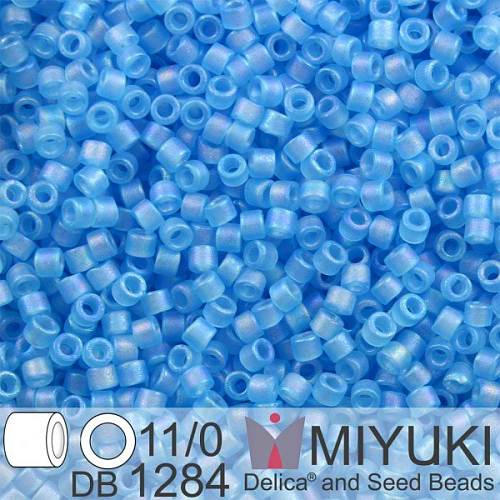 Korálky Miyuki Delica 11/0. Barva Matte Tr Ocean Blue AB DB1284. Balení 5g.