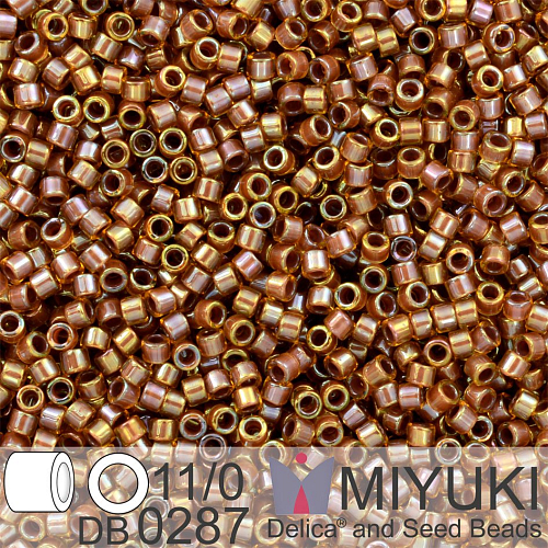 Korálky Miyuki Delica 11/0. Barva Cinnamon Lined Topaz Luster DB0287. Balení 5g