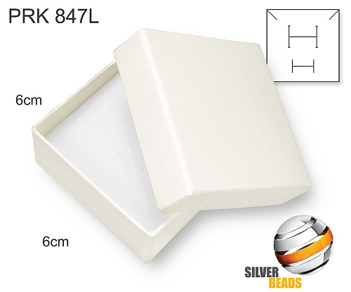 Krabička na šperky. Materiál papír . Ozn. PRK 847L. Velikost 6x6cm. Barva SMETANOVÁ.